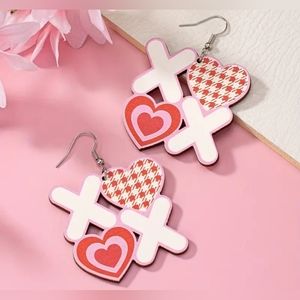 New Light Weight Wooden XOXO Heart Earrings.  Has a little burt Mark See Pic